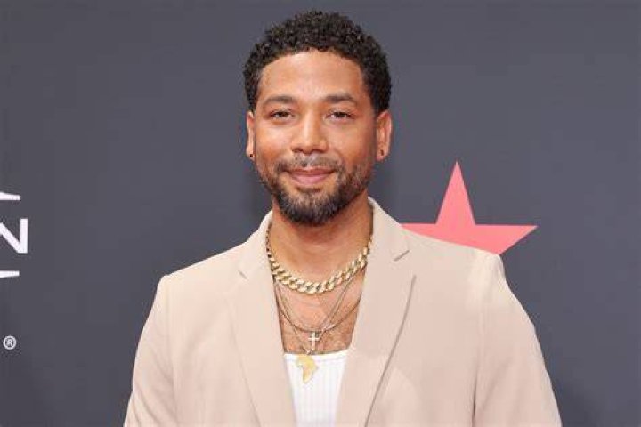 Smollett, 34, put on a show in a ra-ra skirt and thigh-high white boots
